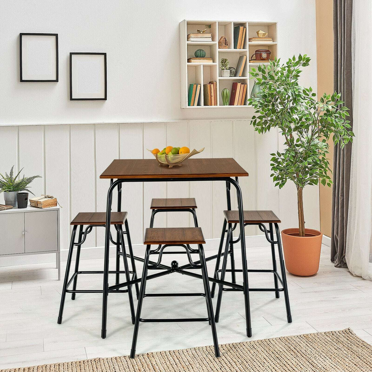 Bar table with four backless stools, rustic brown tops, black frames, and stools tucked around the table.