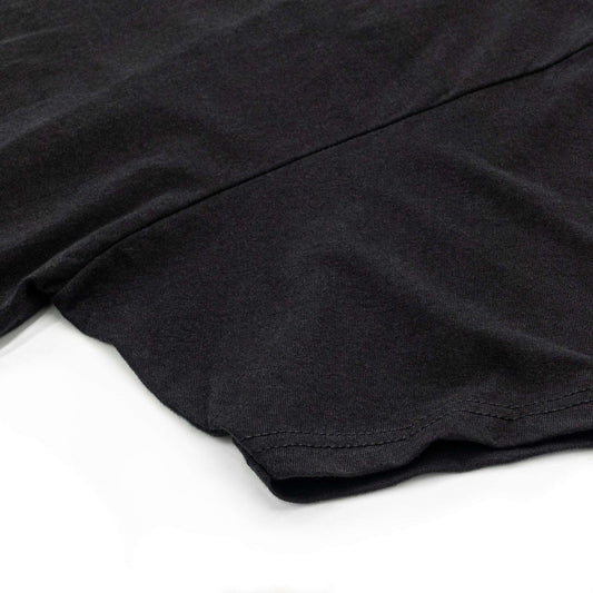 Black T-shirt hem with stitched edge detail