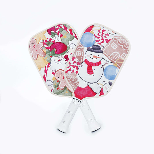 Pair of Christmas themed pickleball paddles with candy-cane and snowman artwork