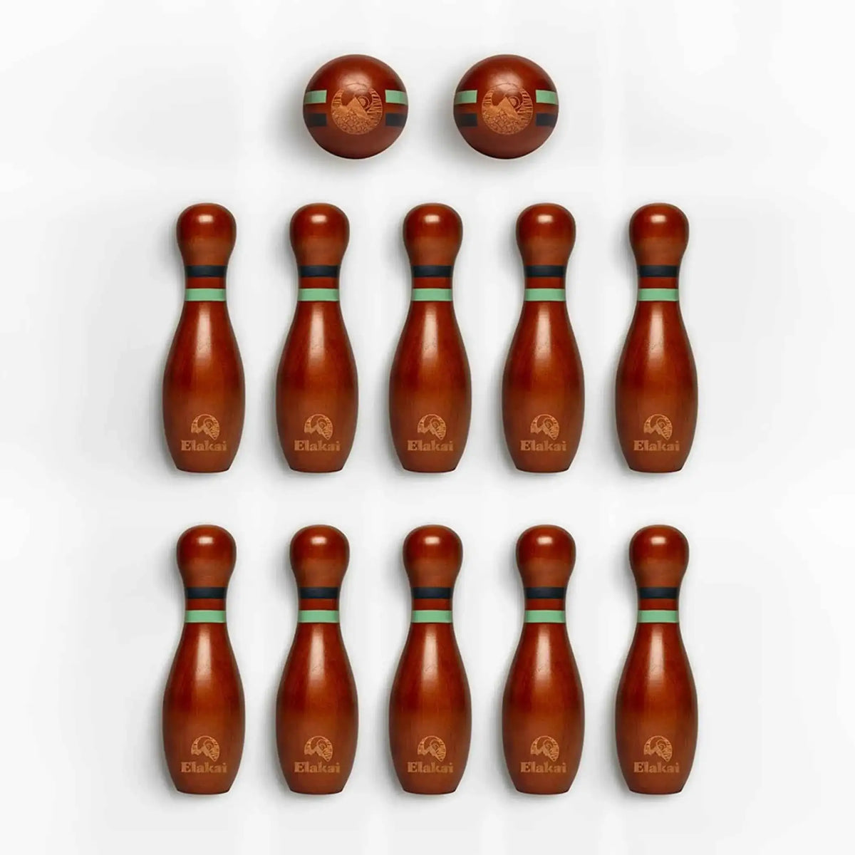 Dark wooden bowling pins with green and blue rings, two on top row