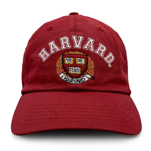 Red baseball cap front view with HARVARD letters and crest patch embroidery
