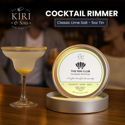 Metal cocktail rimmer salt tin with label, open container of lime salt