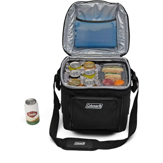 Open black soft cooler with blue liner, food storage compartment, and Coleman logo
