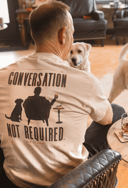 Tan cotton T-shirt with back graphic text: Conversation Not Required