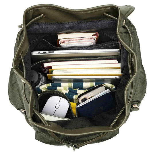 Dark olive travel backpack opened, showing front organizer pockets and zip divider