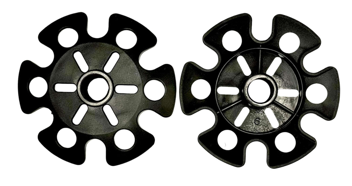 Pair of black trekking pole snow baskets with drainage holes