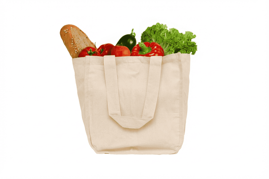 Organic cotton canvas grocery tote bag with bottle sleeves, light tan, filled with produce