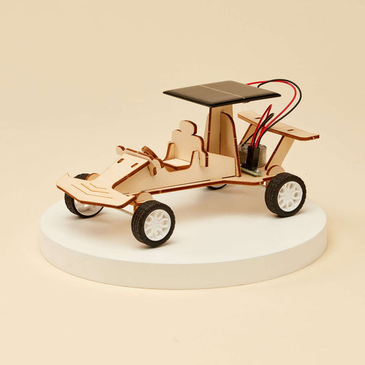 Solar race car DIY kit wooden model with solar panel top and white wheel rims