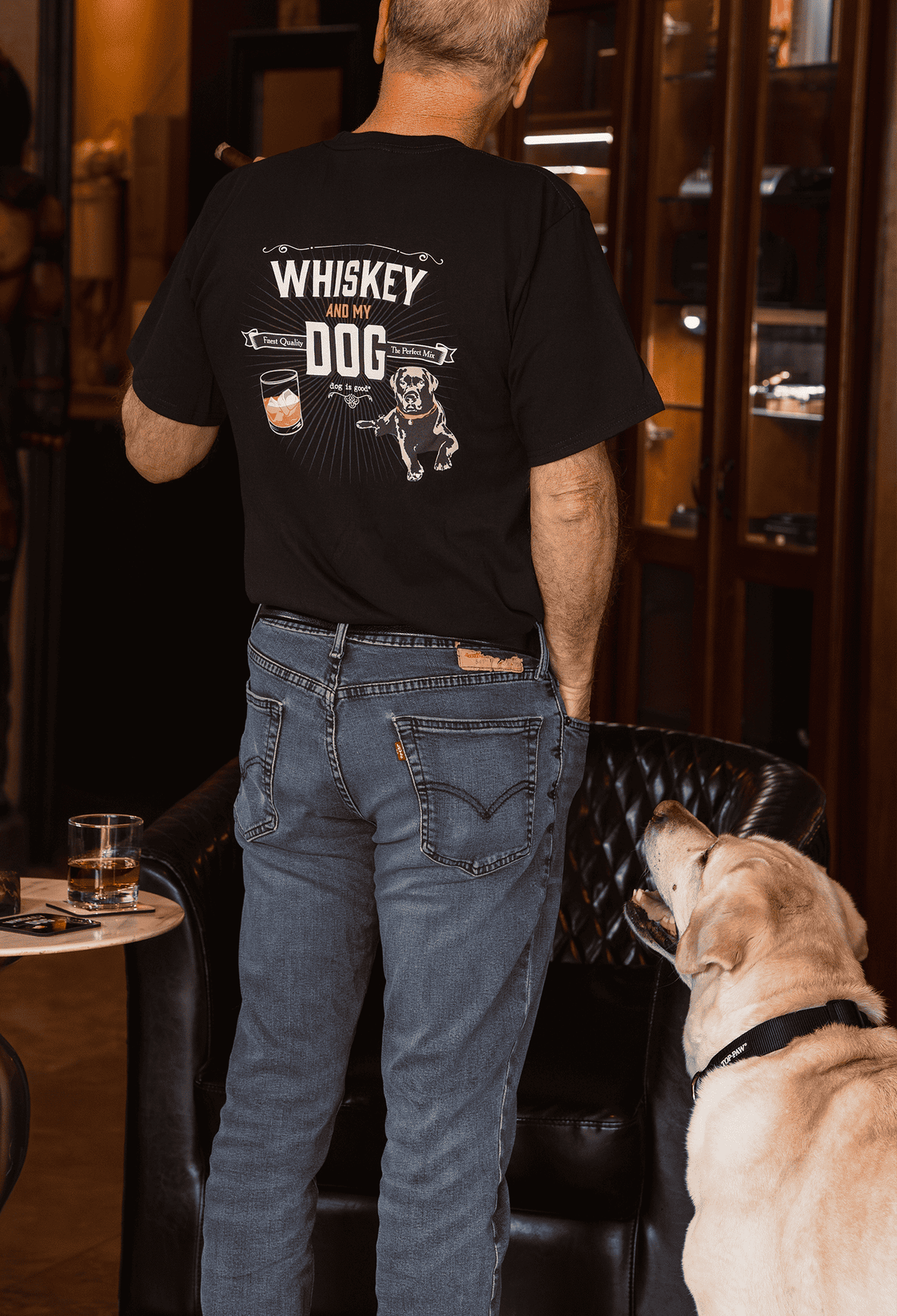 Black cotton T-shirt, back view with “WHISKEY and MY DOG” graphic and dog illustration