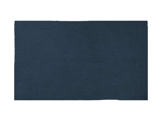 Navy fleece camping blanket laid flat, smooth fabric surface