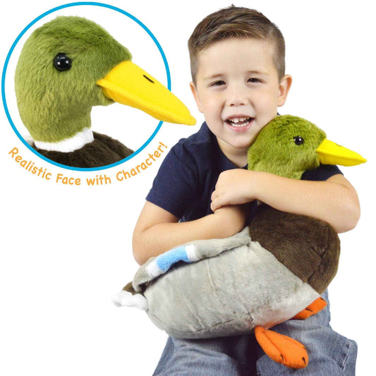 Duck plush held by child; green head, yellow beak, brown body, soft gray wings