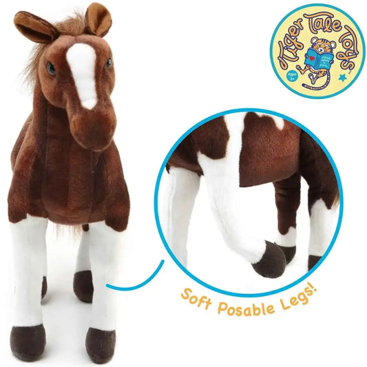 Brown-and-white plush pony with posable legs, front side view