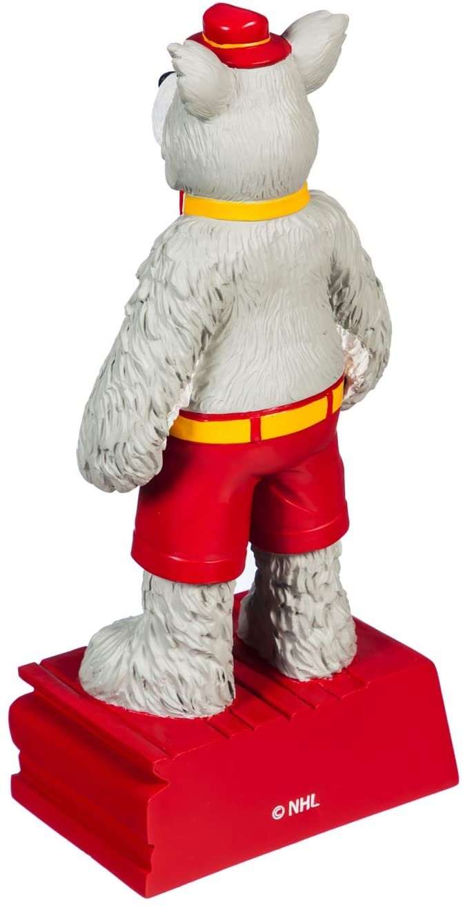 Calgary Flames mascot garden statue, side view white dog in red shorts on base marked NHL