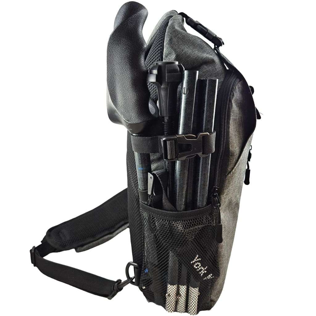 Black sling backpack with pole holder straps and mesh side pocket