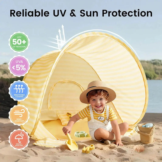 Children’s yellow striped beach tent with mesh front opening and UV canopy