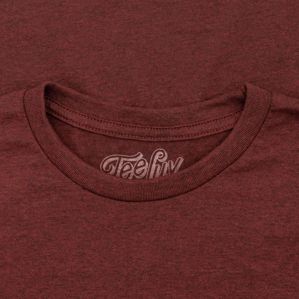Red crew-neck T-shirt with Teeluv neck label