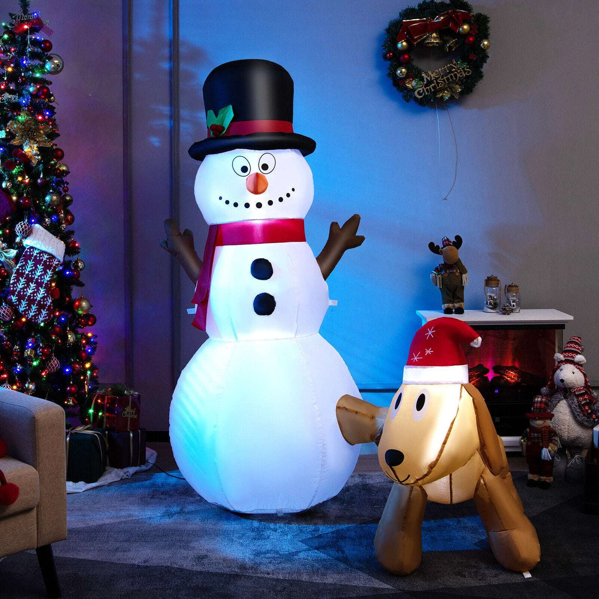 Illuminated inflatable snowman and tan dog Christmas decoration with festive hats