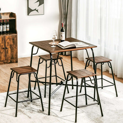 Bar table and four backless stools arranged for dining, with rustic brown tops and black metal frames.