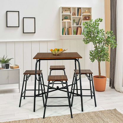 Bar table with four backless stools, rustic brown tops, black frames, and stools tucked around the table.