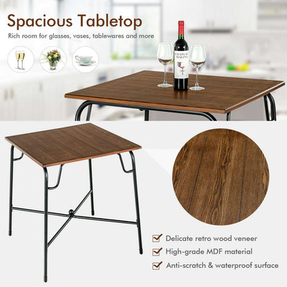 Close view of the rustic brown wood-look tabletop and black metal table frame.