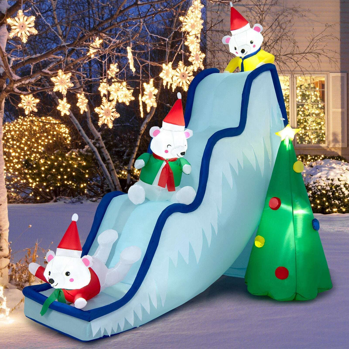Inflatable polar bear Christmas slide with three bears, a decorated tree and LED lights