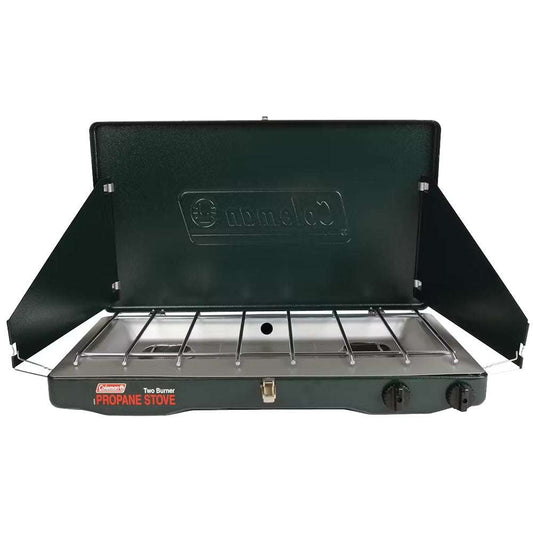 Coleman propane camping stove with two burners, open lid and control knob, dark green