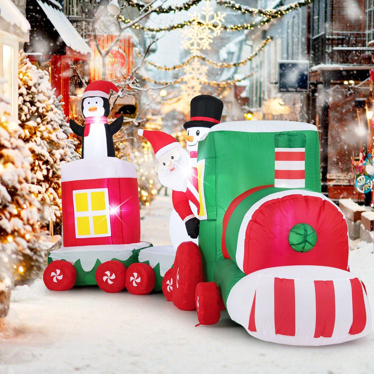Christmas inflatable train seen from the front, with Santa, snowman, and penguin figures