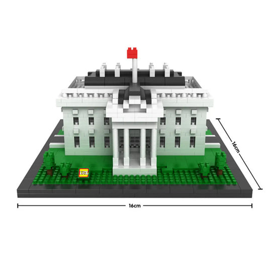 White and dark-gray block model of a neoclassical building with red spire and green base