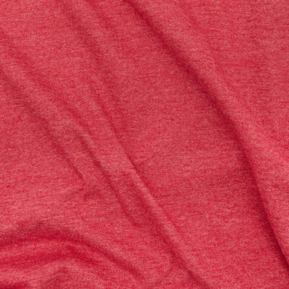 Red heather T-shirt fabric texture close-up with heathered knit pattern
