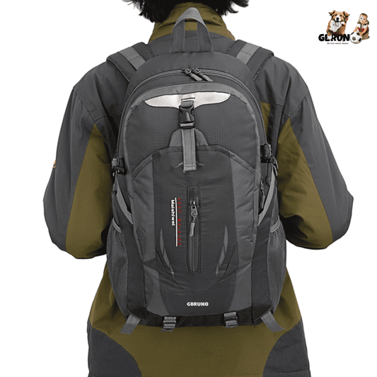 Dark gray hiking backpack with front organizer pocket and adjustable shoulder straps