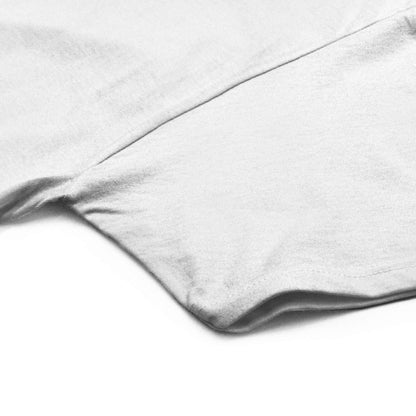 White T-shirt fabric close-up with subtle seam