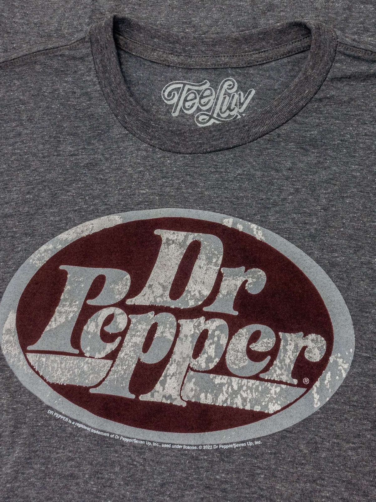 Gray T-shirt with close-up Dr Pepper oval logo print and Tee Liv neckline tag