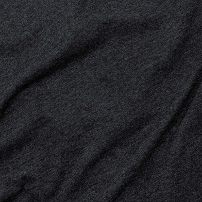 Charcoal gray T-shirt fabric close-up with heather texture.