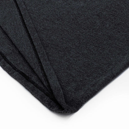 Charcoal gray T-shirt side seam and bottom hem detail.