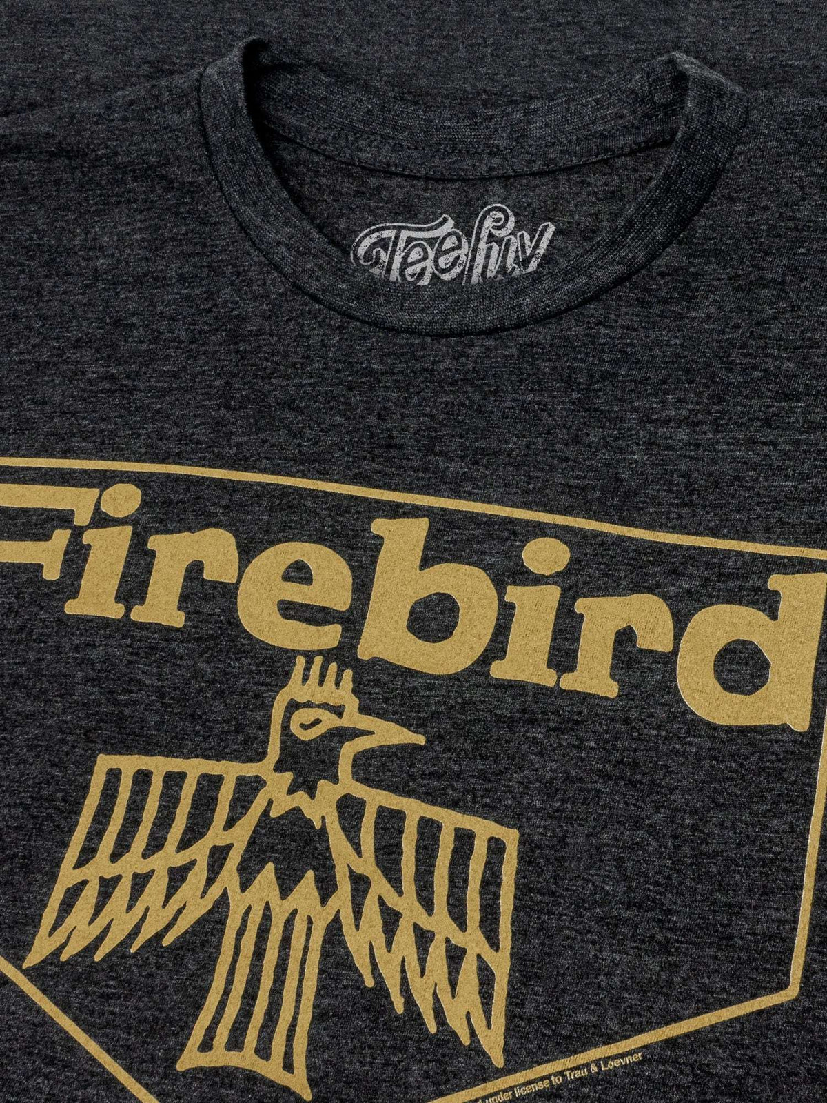Charcoal gray T-shirt close-up of Firebird logo print.