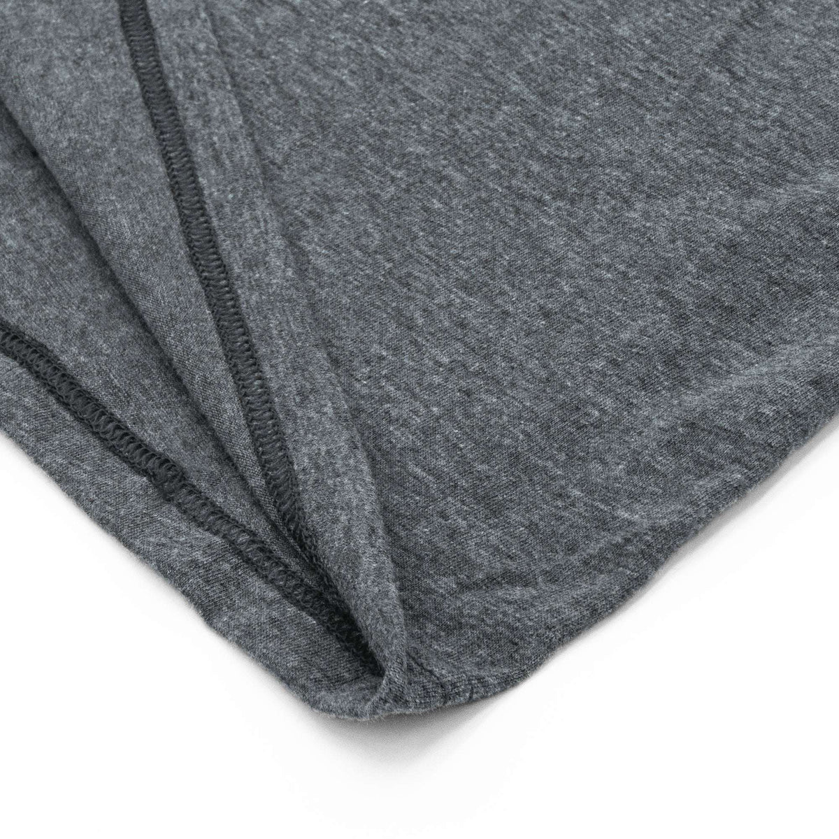 Heather gray T-shirt corner with stitched trim along the sleeve/side seam