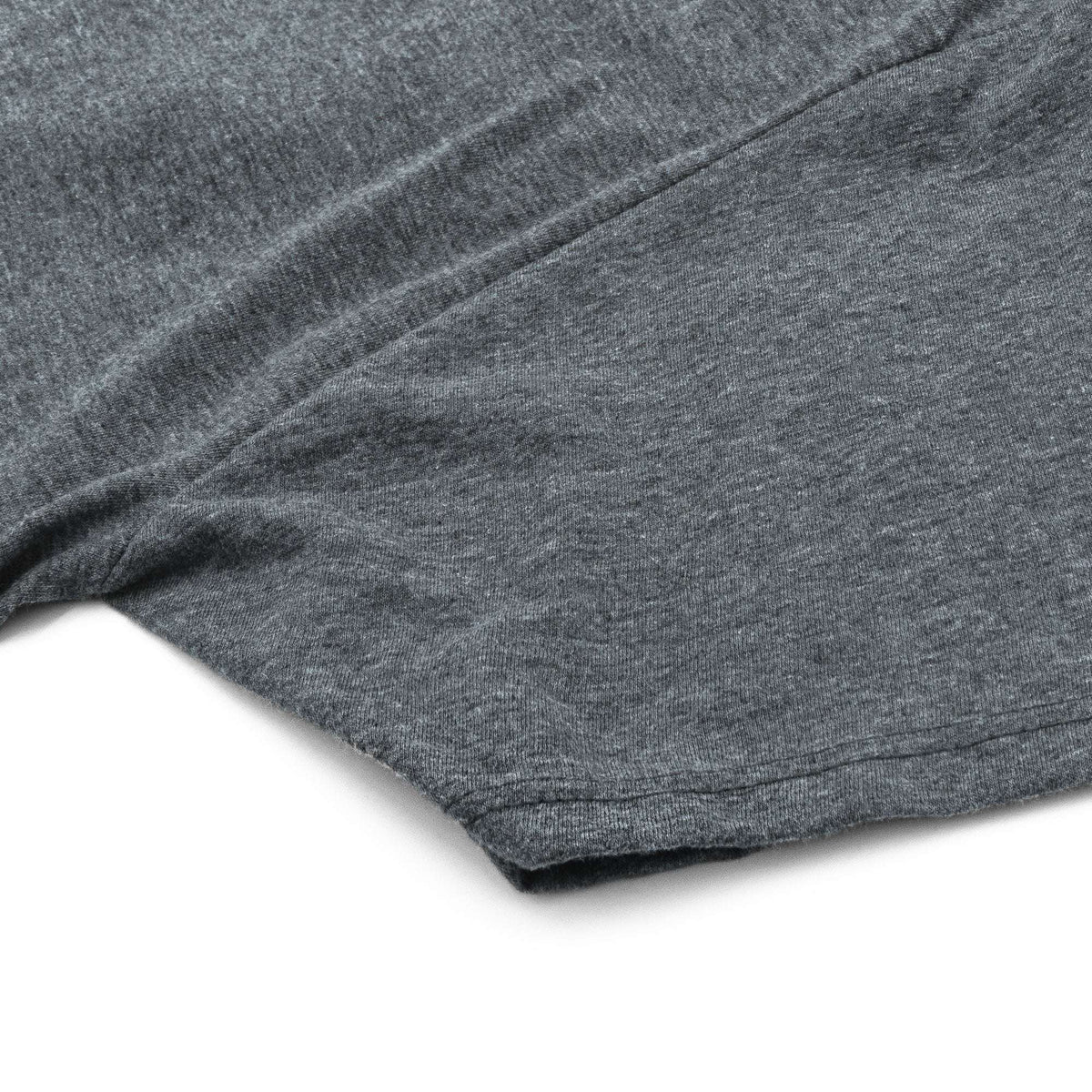 Heather gray T-shirt with smooth fabric drape and visible hem seam