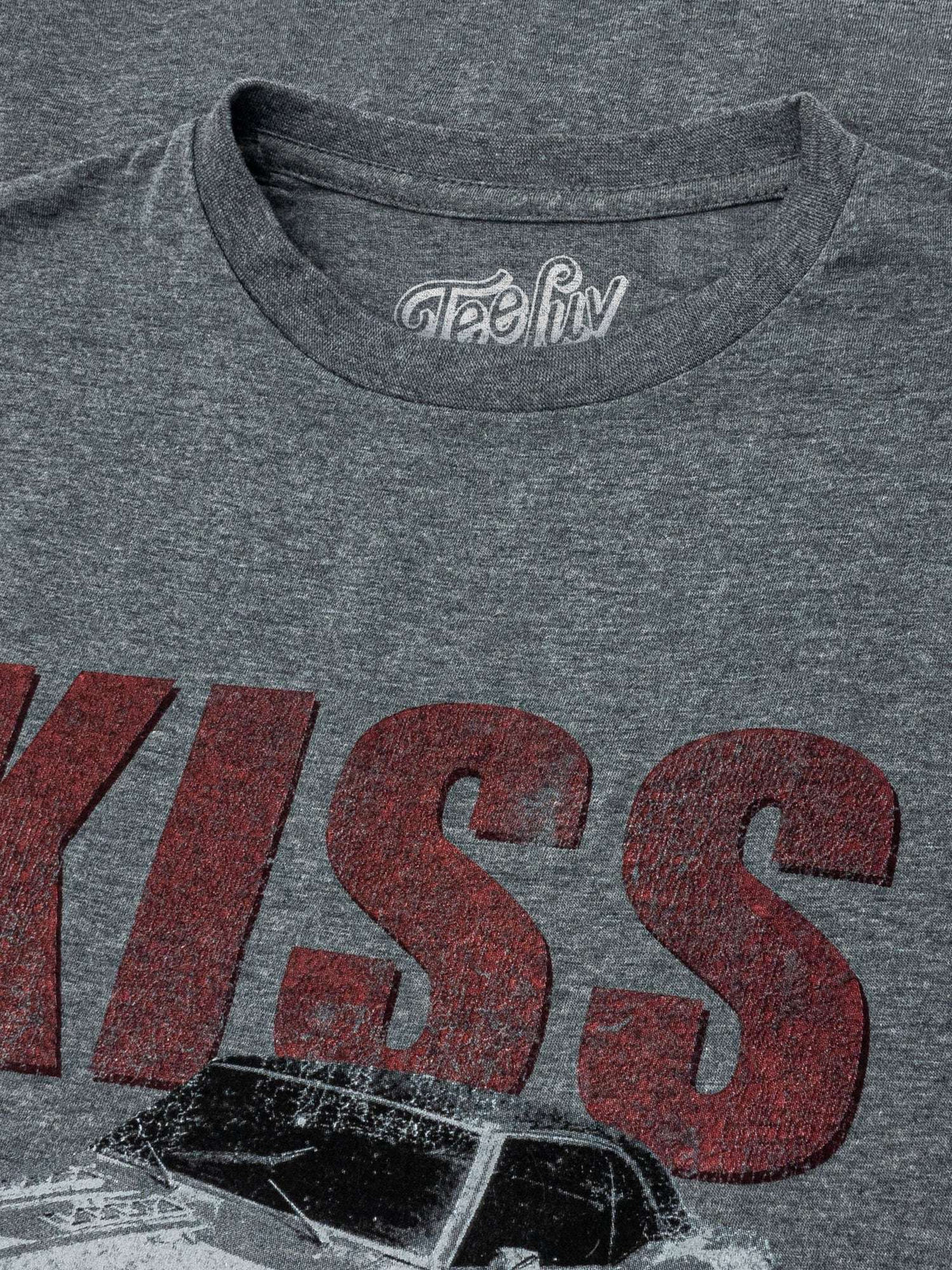 Heather gray T-shirt close-up of neckline and large red "KISS" text with car graphic