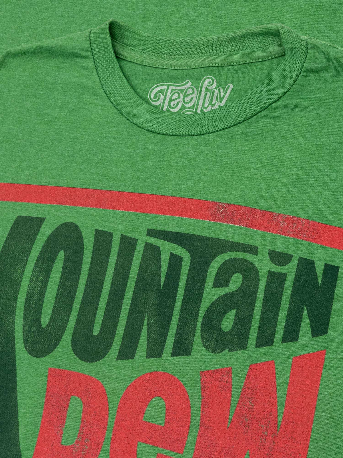 Green T-shirt neckline with TeeLuv logo and Mountain Dew graphic
