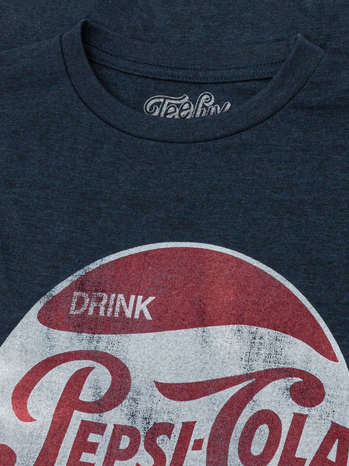 Navy crew-neck T-shirt close-up of Drink Pepsi Cola chest graphic