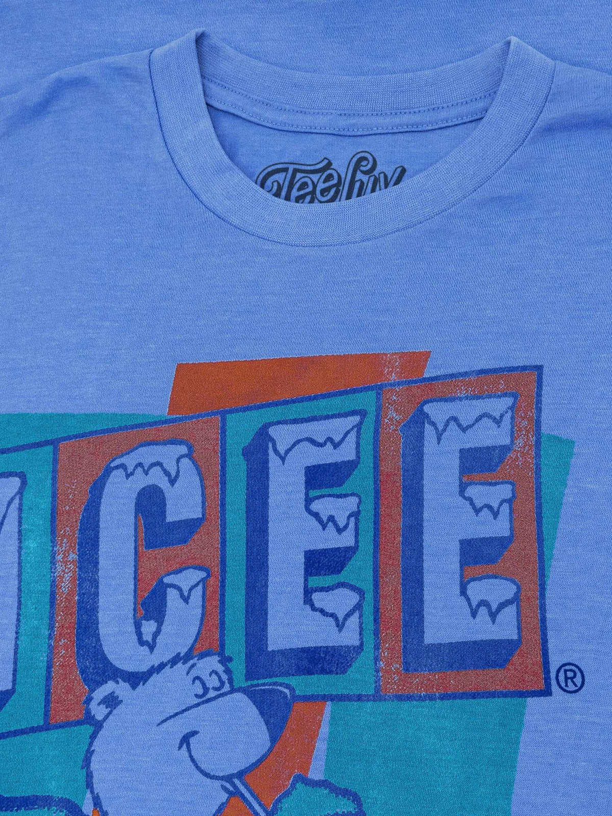 Blue T-shirt close-up: ICEE graphic print and crew neckline