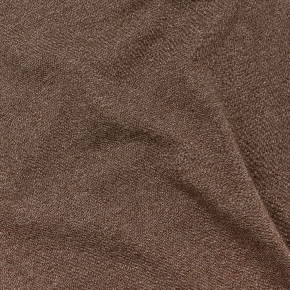 Brown heather knit T-shirt fabric close-up