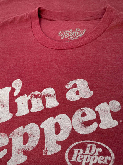 Red T-shirt close-up with 'I'm a Pepper' text and Dr Pepper logo