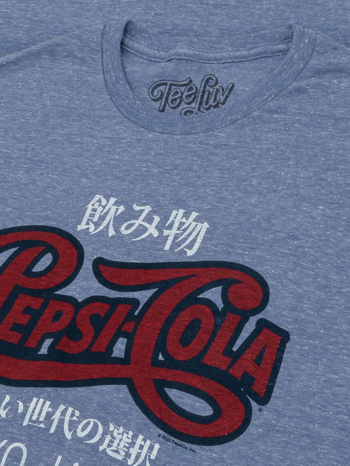 Light blue heather T-shirt close-up of Pepsi Cola Tokyo Japan logo print
