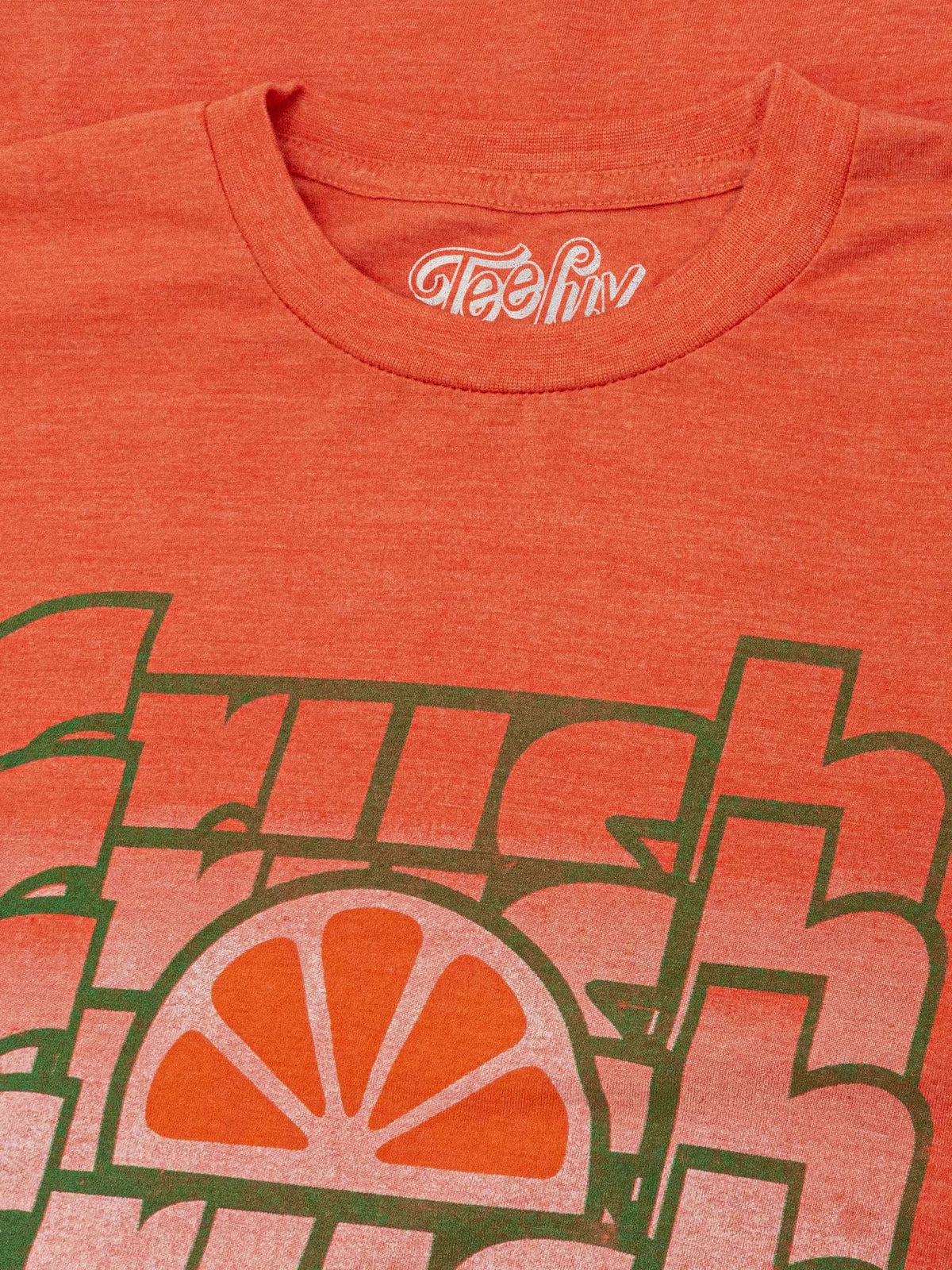 Heather orange T-shirt with Crush Orange chest graphic and crew neckline