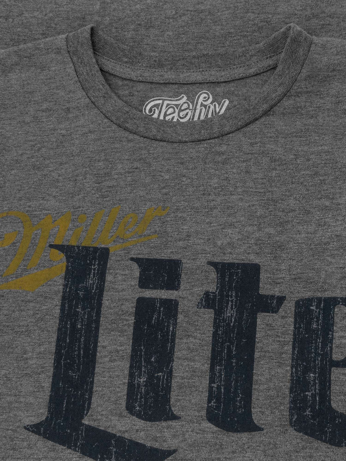 Gray T-shirt chest print with distressed Miller Lite and large “Lite” text