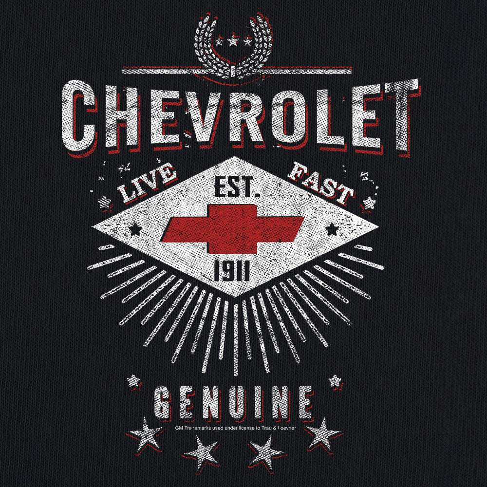 Close-up of Chevrolet logo, LIVE FAST EST. FAST artwork, and GENUINE lettering on black tee
