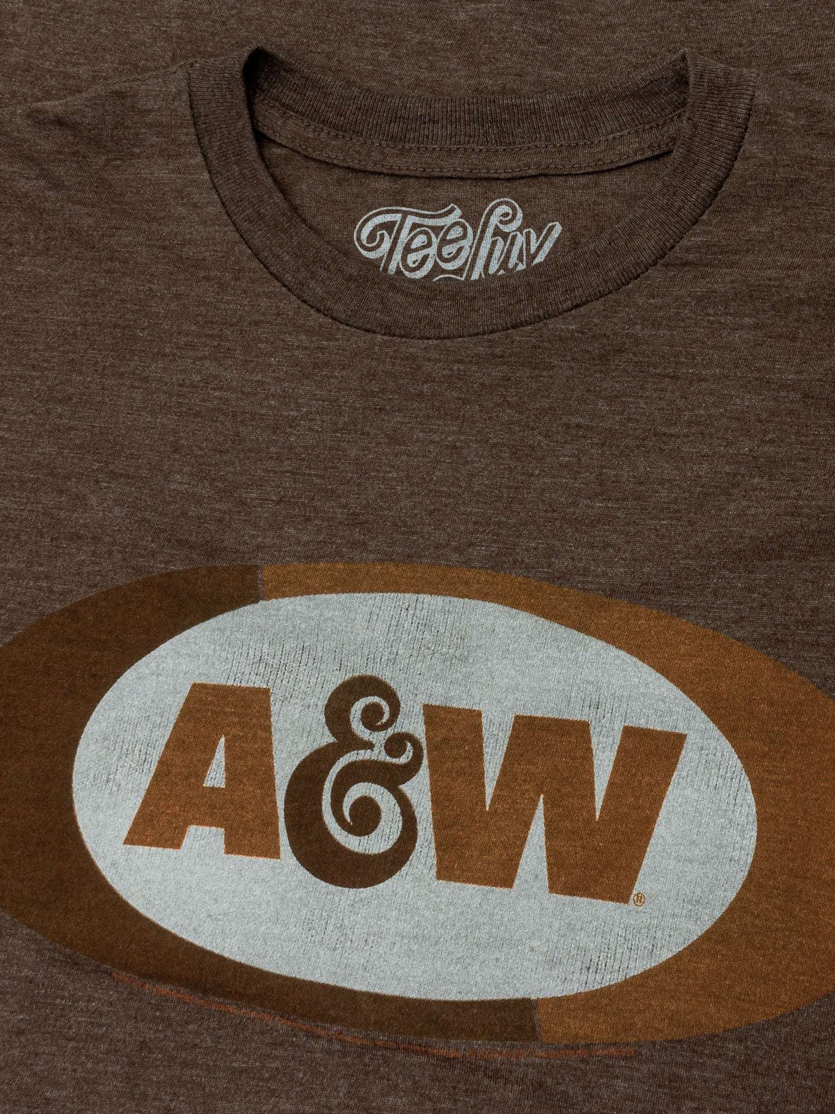 Brown heather T-shirt with Teeluv logo print near the neckline