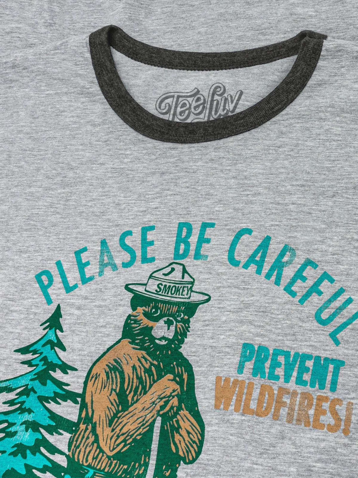 Gray ringer T-shirt neckline with black trim and colorful Smokey Bear text print