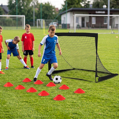 Portable soccer goal with net beside red training cones and a soccer ball.